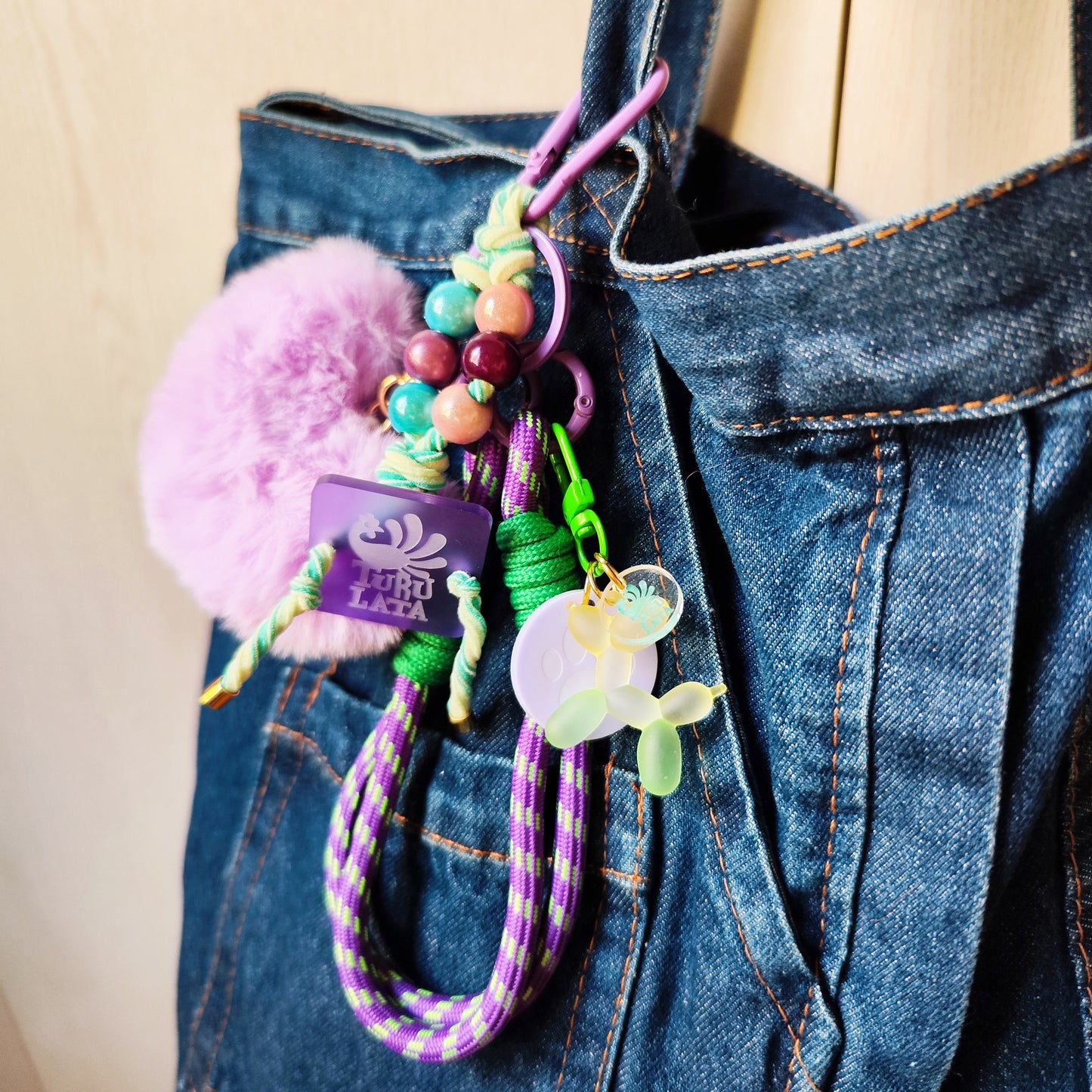 charm CORAZON PELUCHE MORADO EXTENSIBLE