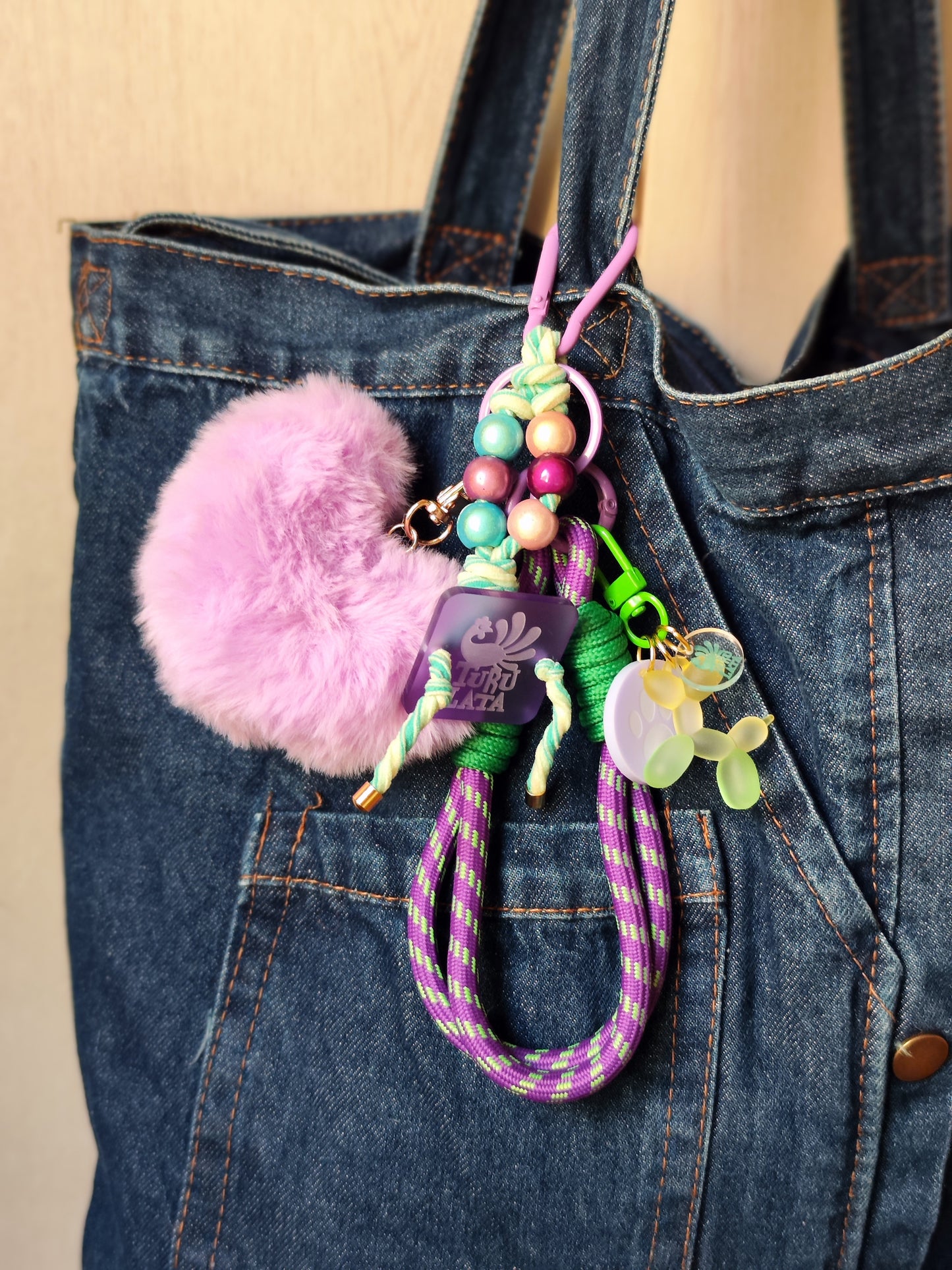 charm CORAZON PELUCHE MORADO EXTENSIBLE